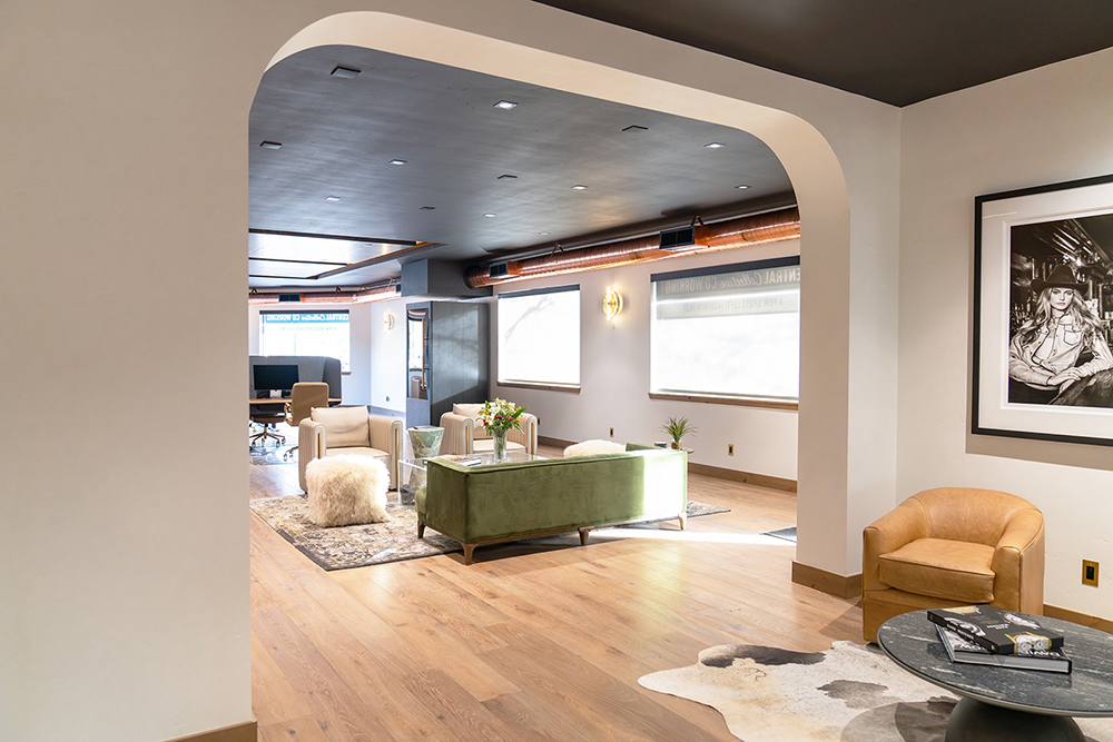 Central Collective lobby seating area with warm ambient lighting